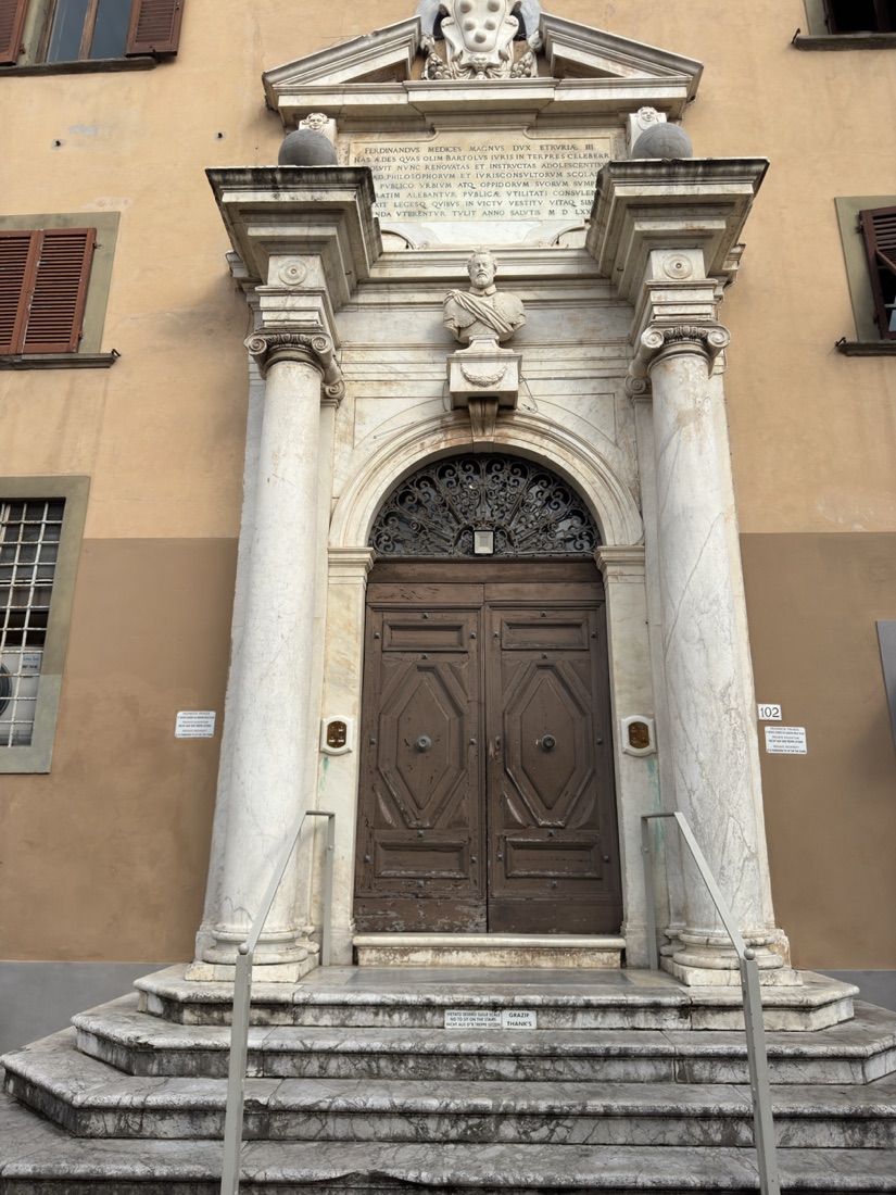 The marble monumental portal of Collegio Ferdinando